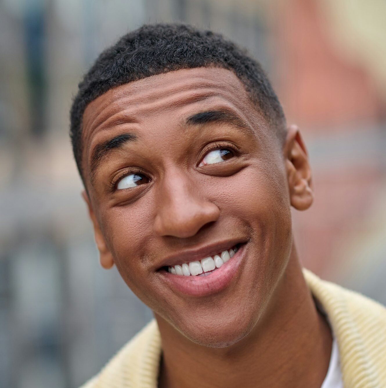 Headshot of a smiling handsome young man